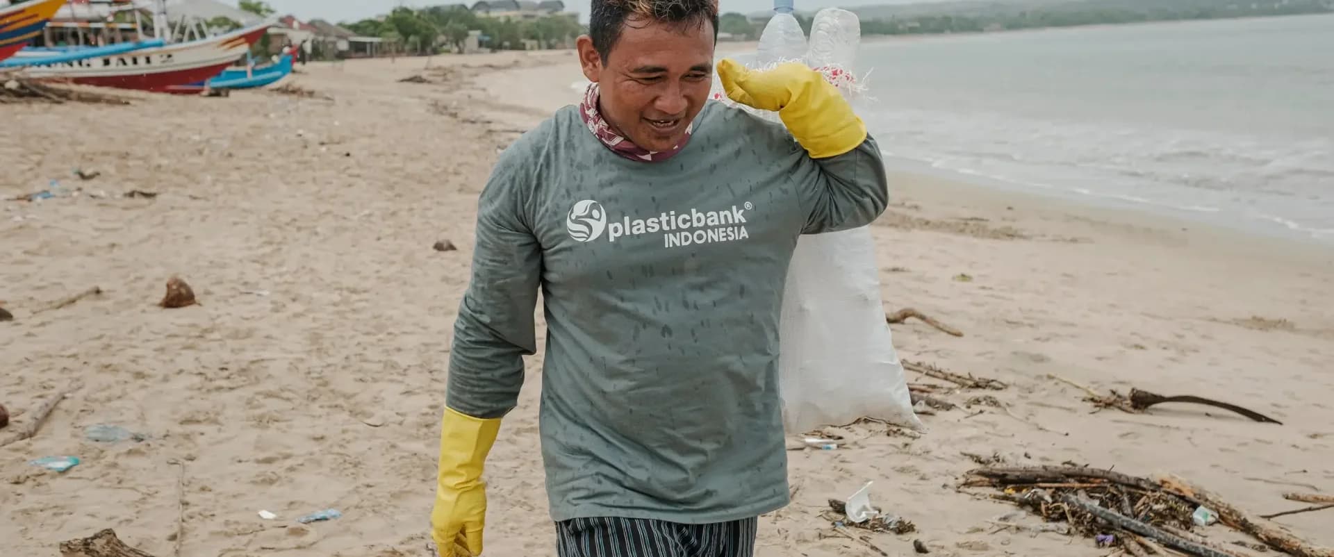 Juhari uses a motorbike to take his recycling to a branch