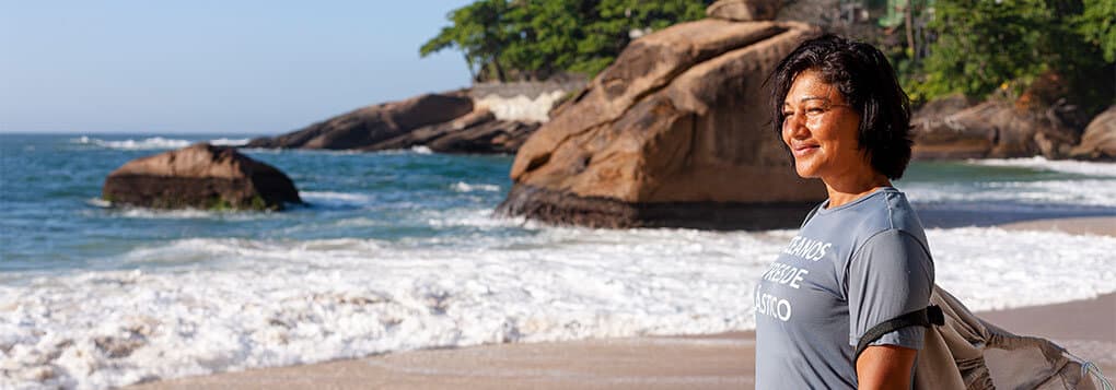 Member Andrea Castro looking to the ocean in Vidigal Community