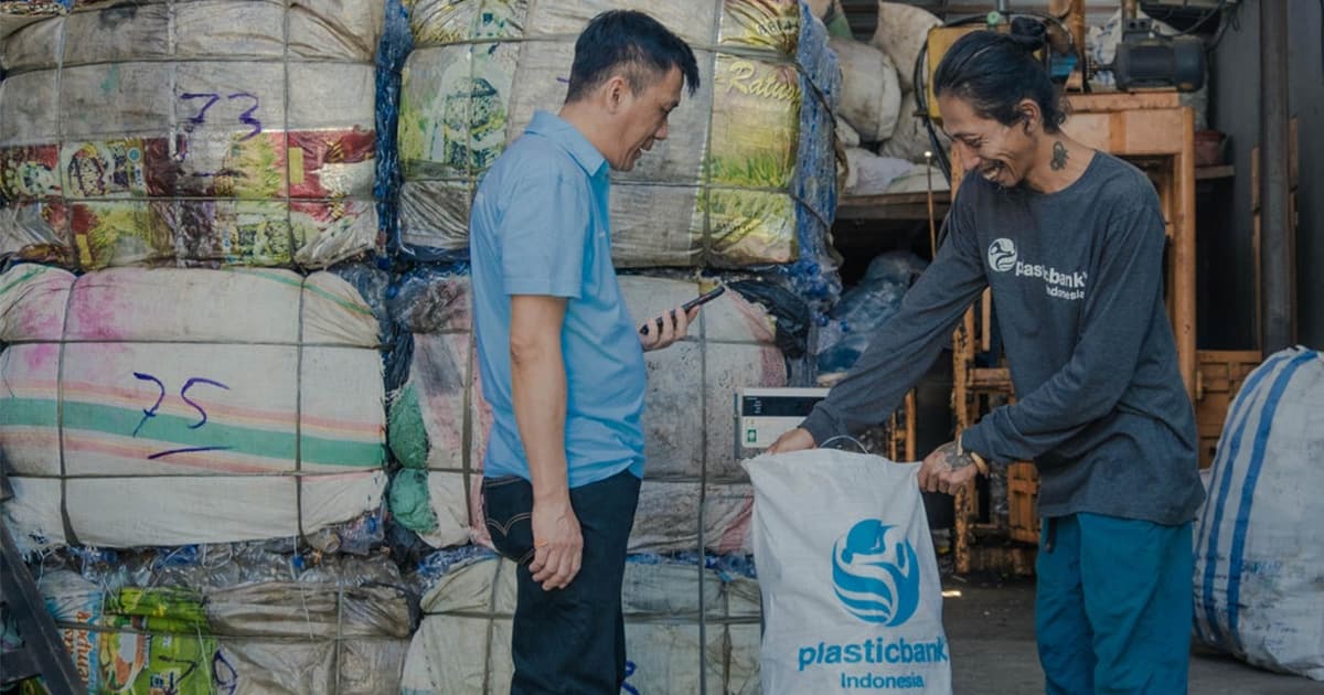 An exchange being weighed and verified at a Plastic Bank collection branch