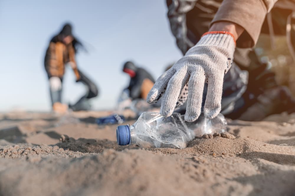 Picking up a plastic bottle