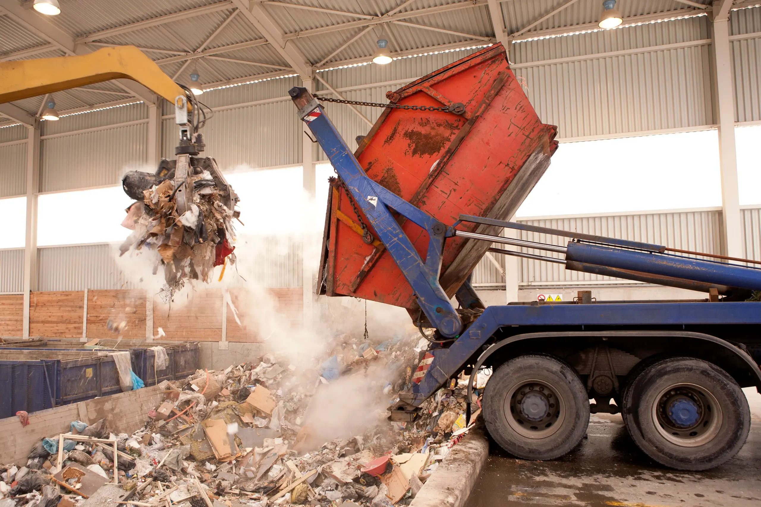 Truck dumps waste for incinerator