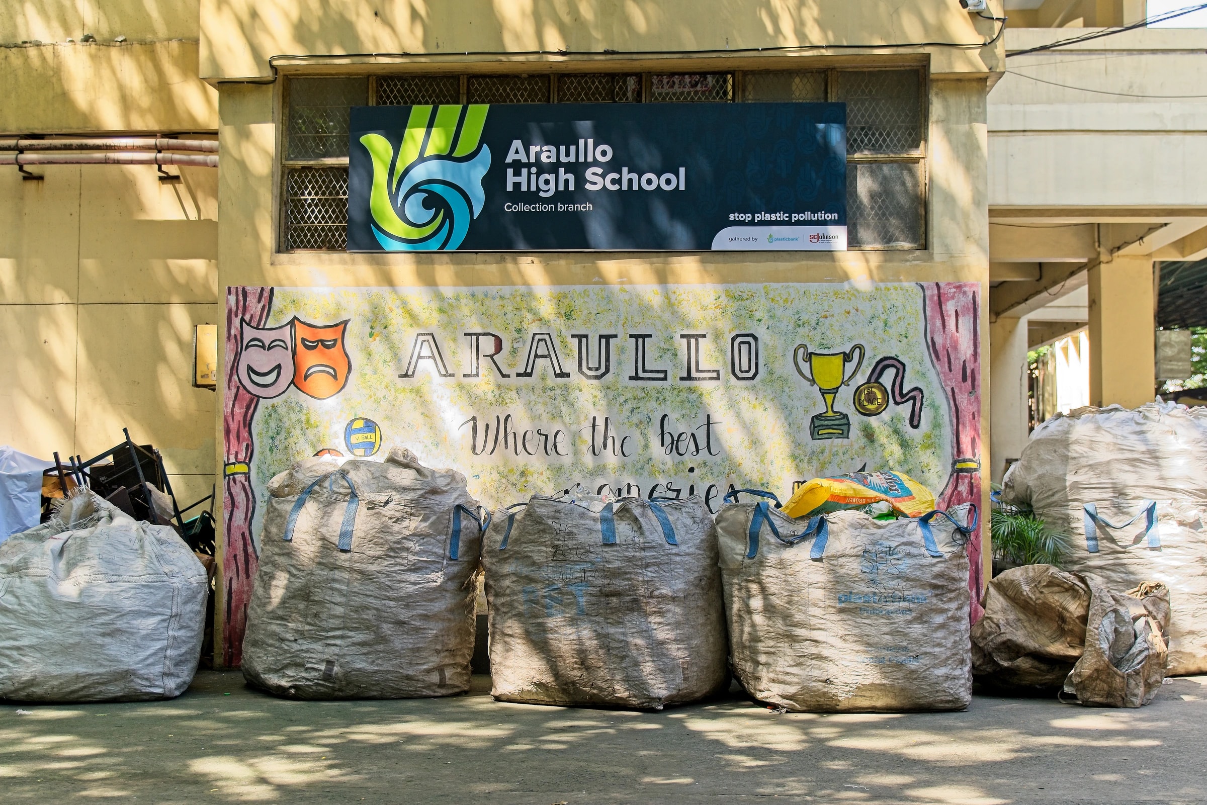 Sacks of collected plastic outside the Araullo High School Plastic Bank collection branch
