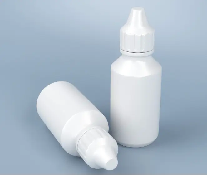 Two white dropper bottles on a blue background