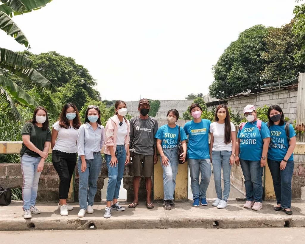 Katuwang sa Kalikasan: PHILUSA team, Plastic Bank representatives, and Plastic Bank waste collectors